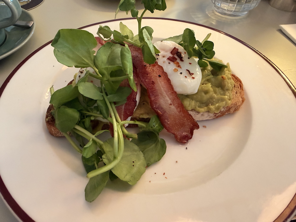 Mollies Manchester Hotel Review Breakfast avocado, bacon poached eggs on sourdough