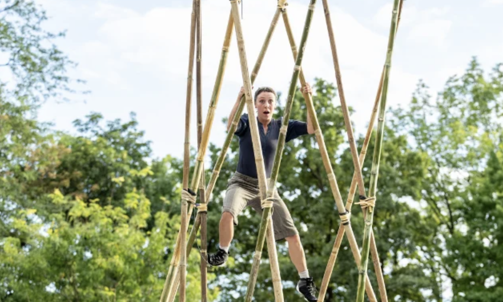 Refract 26 Family Events a lady high up in bamboo