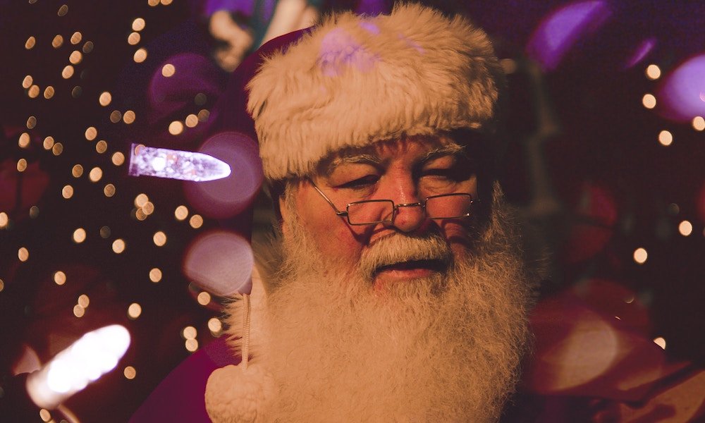 santa clause with lights and a real beard