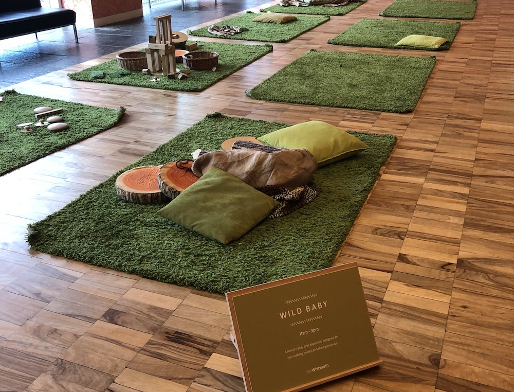 Whitworth Art Gallery mats on the floor with art for children to explore